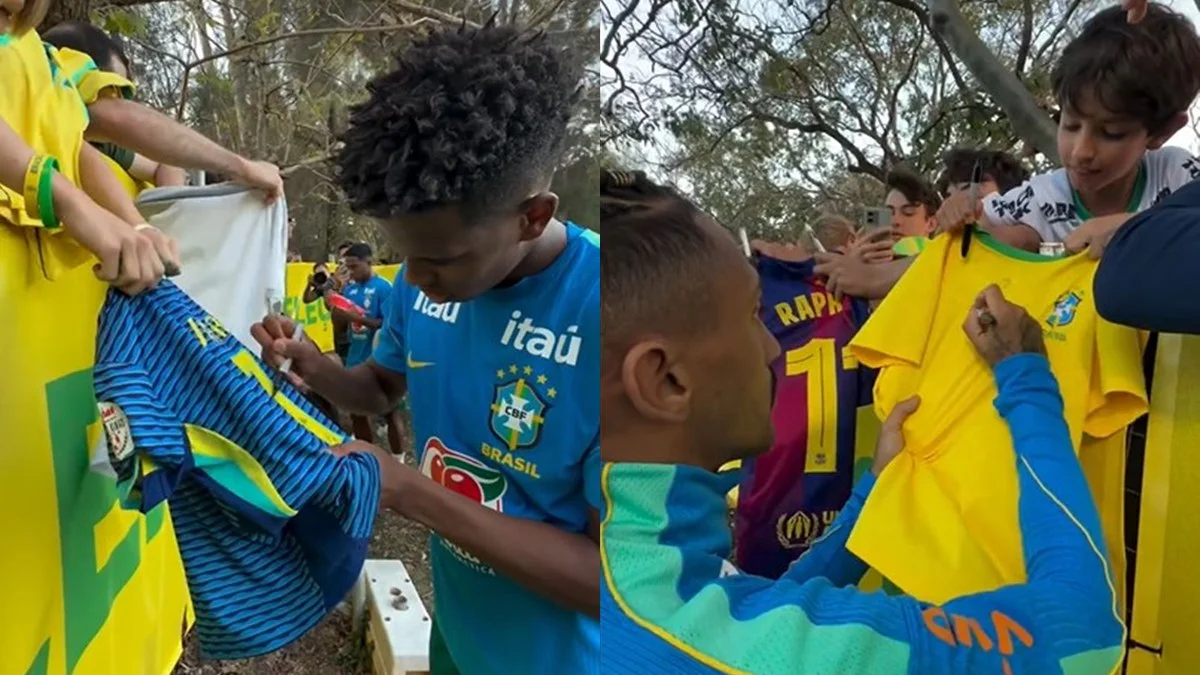 Jogadores da Seleção Brasileira distribuem fotos e autógrafos após treino