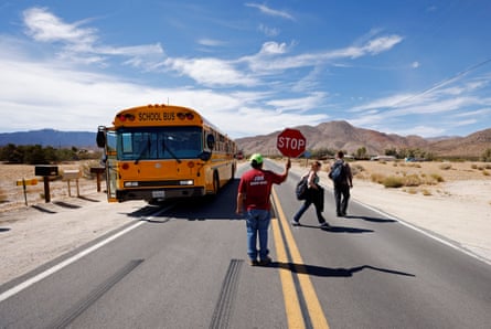 people getting off a bus